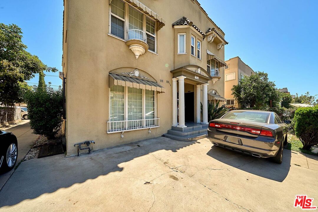 a car parked in front of a house