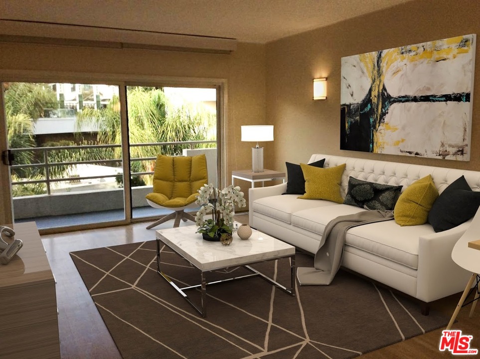 a living room with furniture and a floor to ceiling window