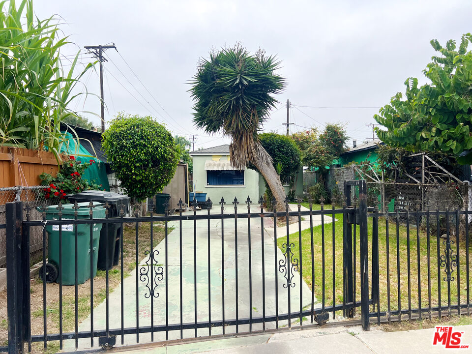 a front view of house having yard