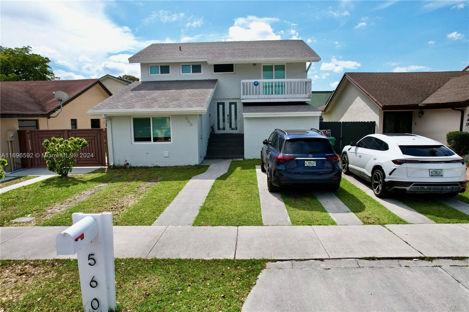 a house view with a garden space