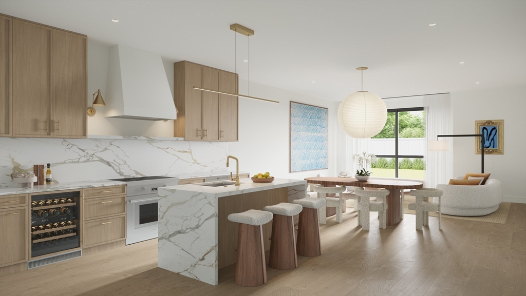 a kitchen with a sink cabinets and window