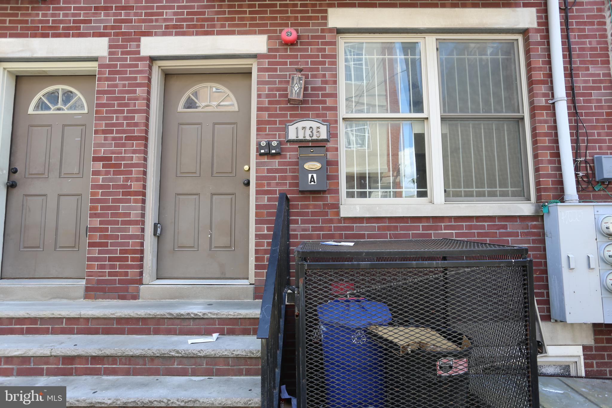 a front view of a house with a door