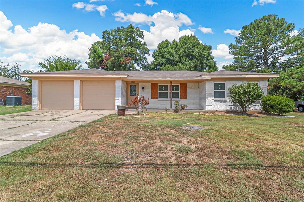 front view of a house with a patio