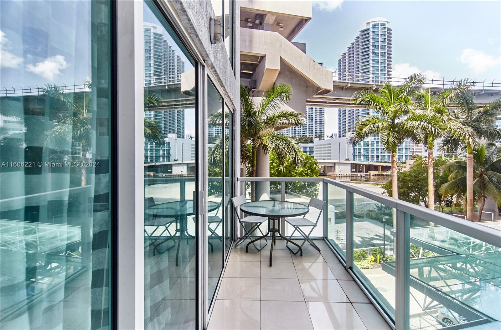 a view of a balcony with chairs