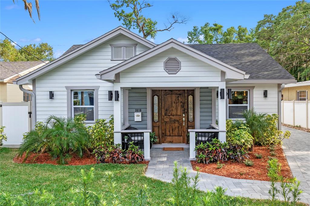 front view of a house with a yard