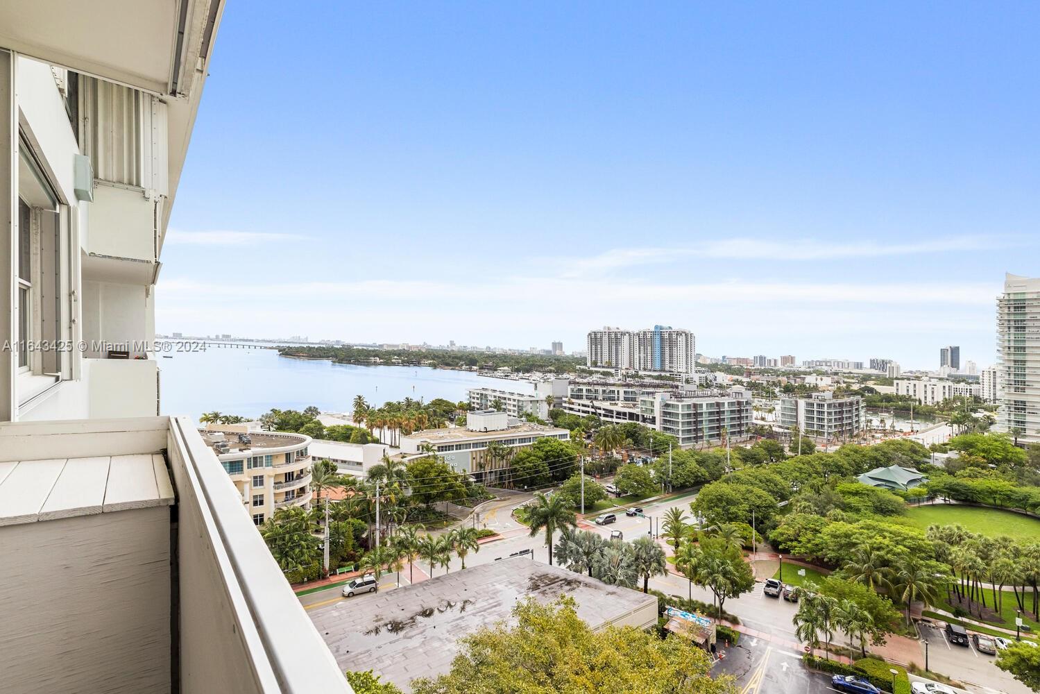 a view of a balcony with an ocean view