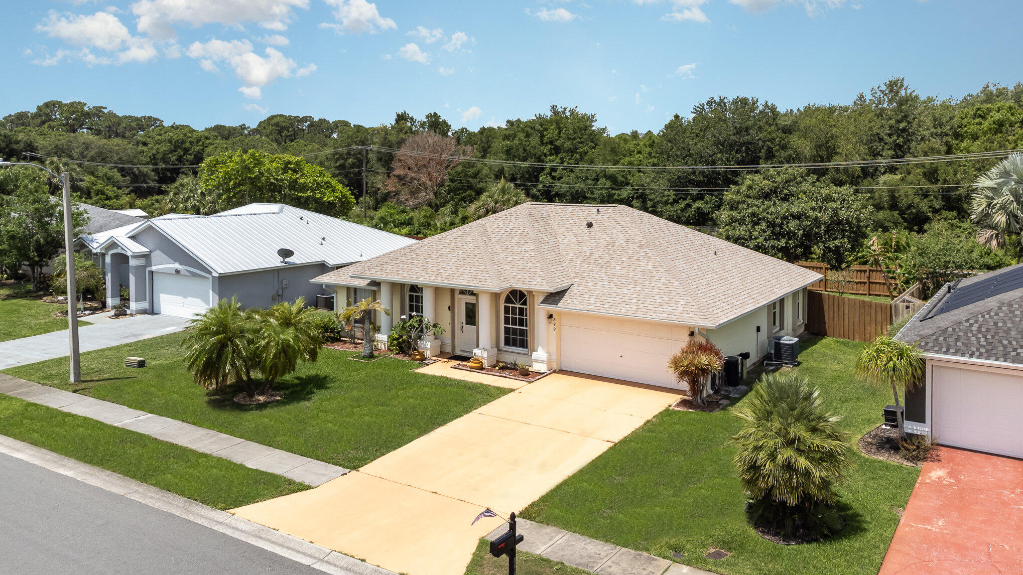 a aerial view of a house with garden