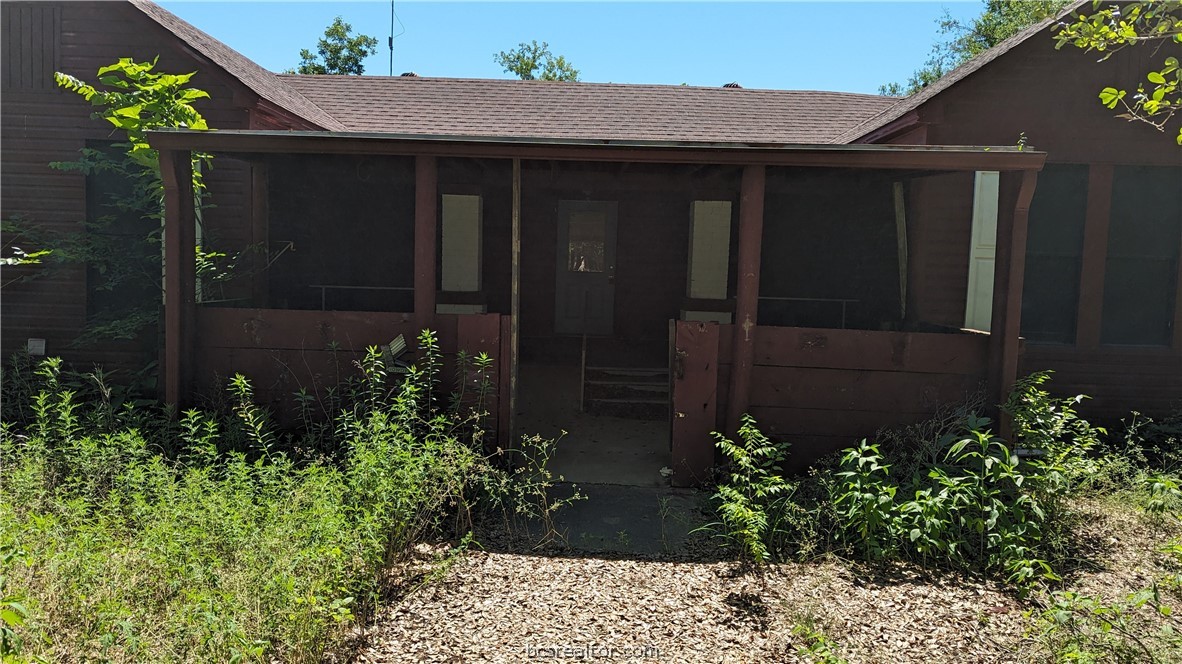 a view of a pathway in front of house