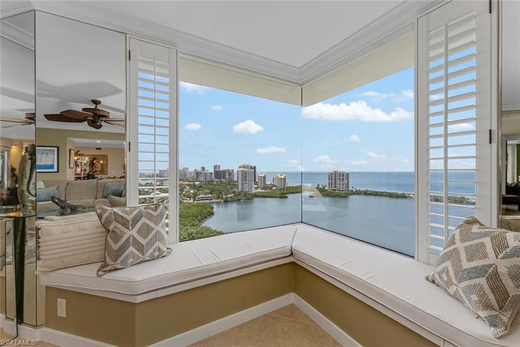 a view of a balcony and ocean view