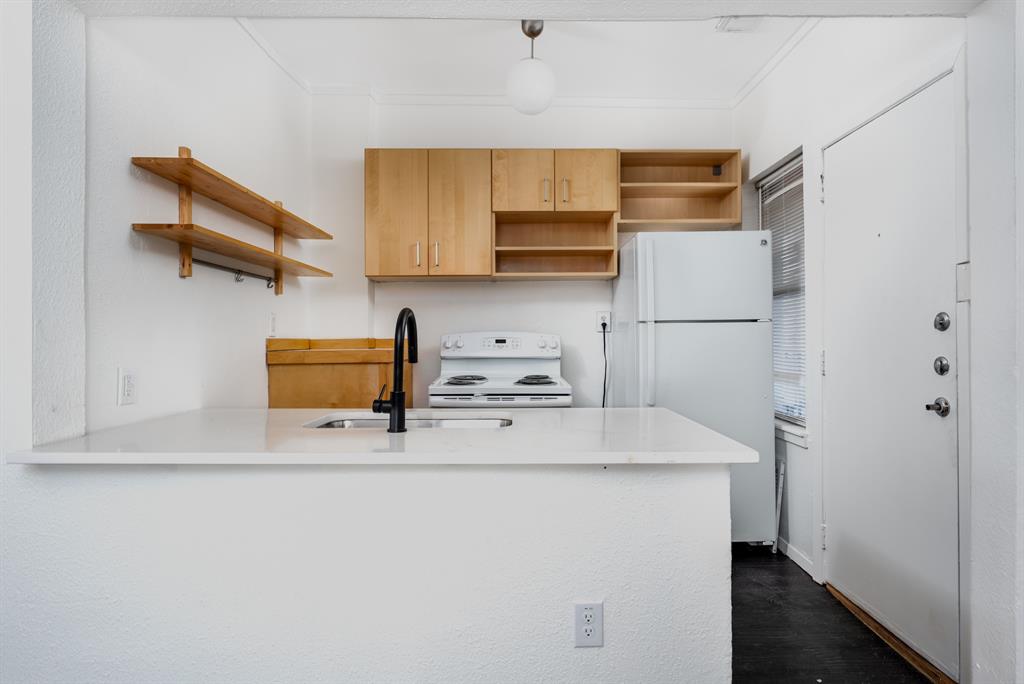 a utility room with washer and dryer