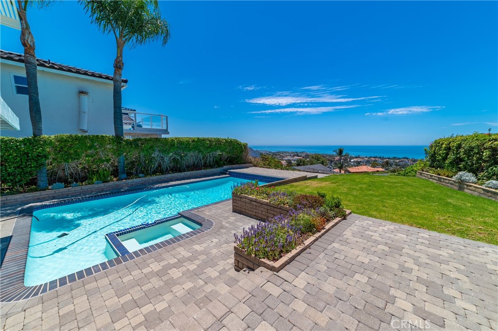 a view of a garden with an outdoor space