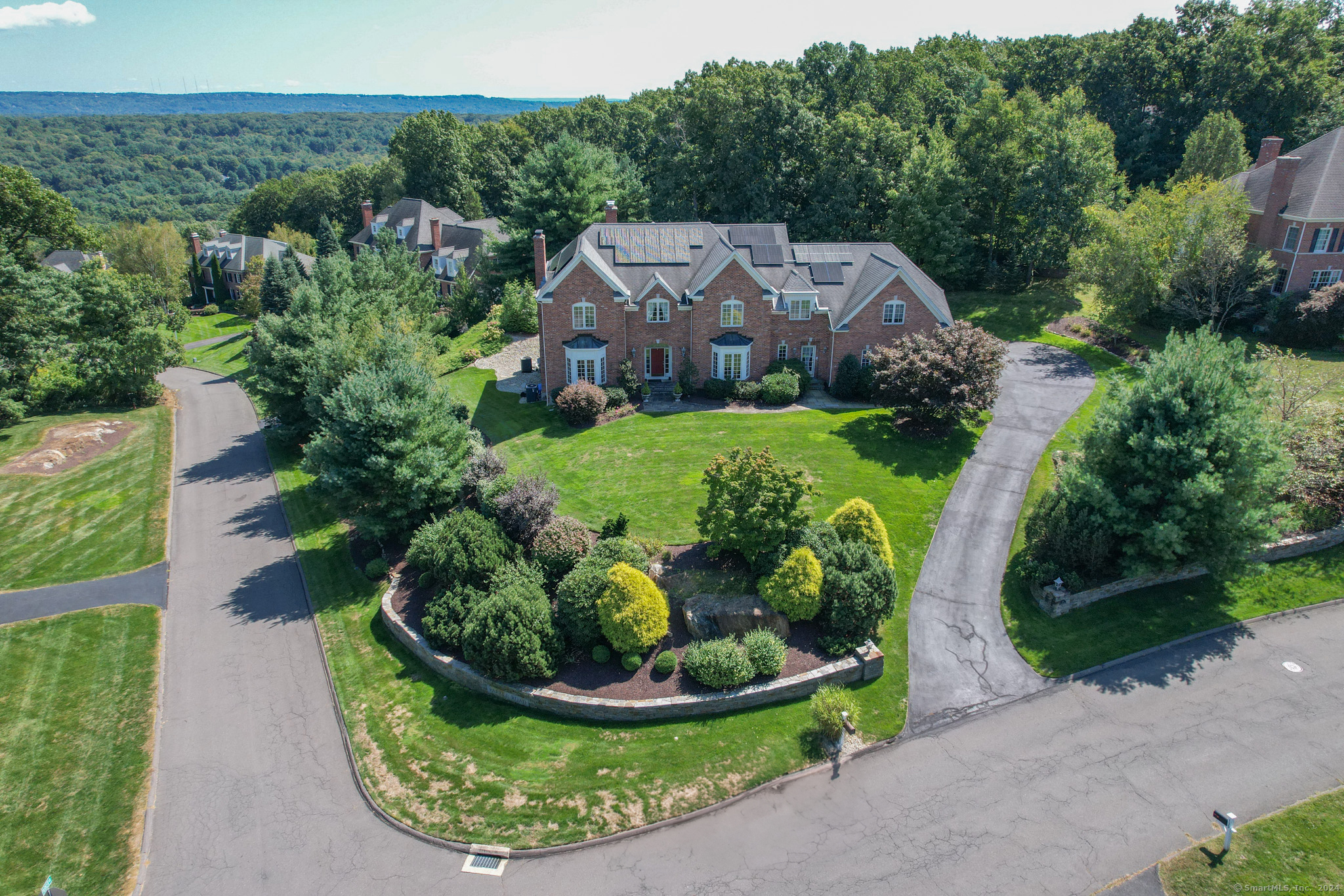 an aerial view of a house with garden