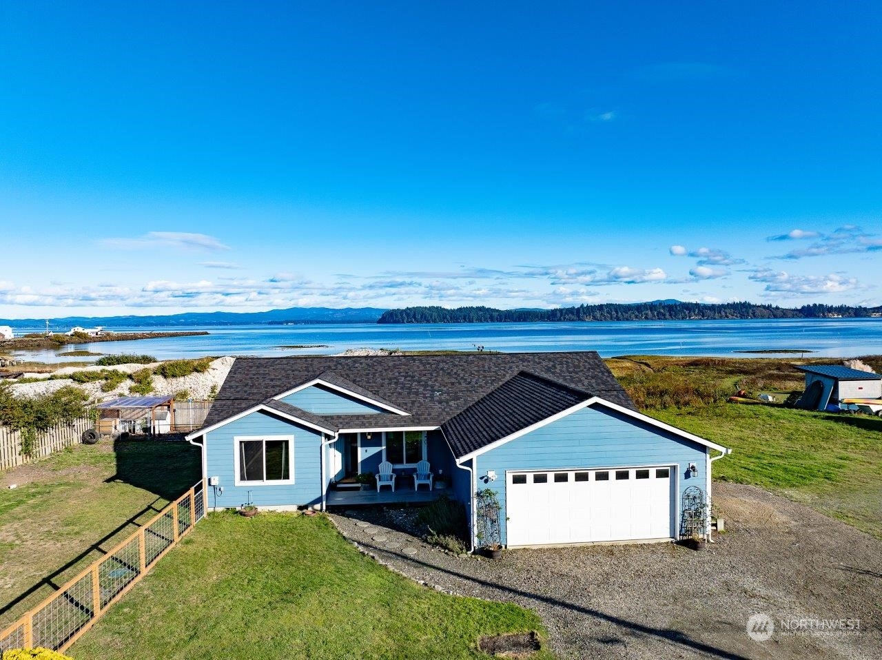 a view of a house with a ocean view