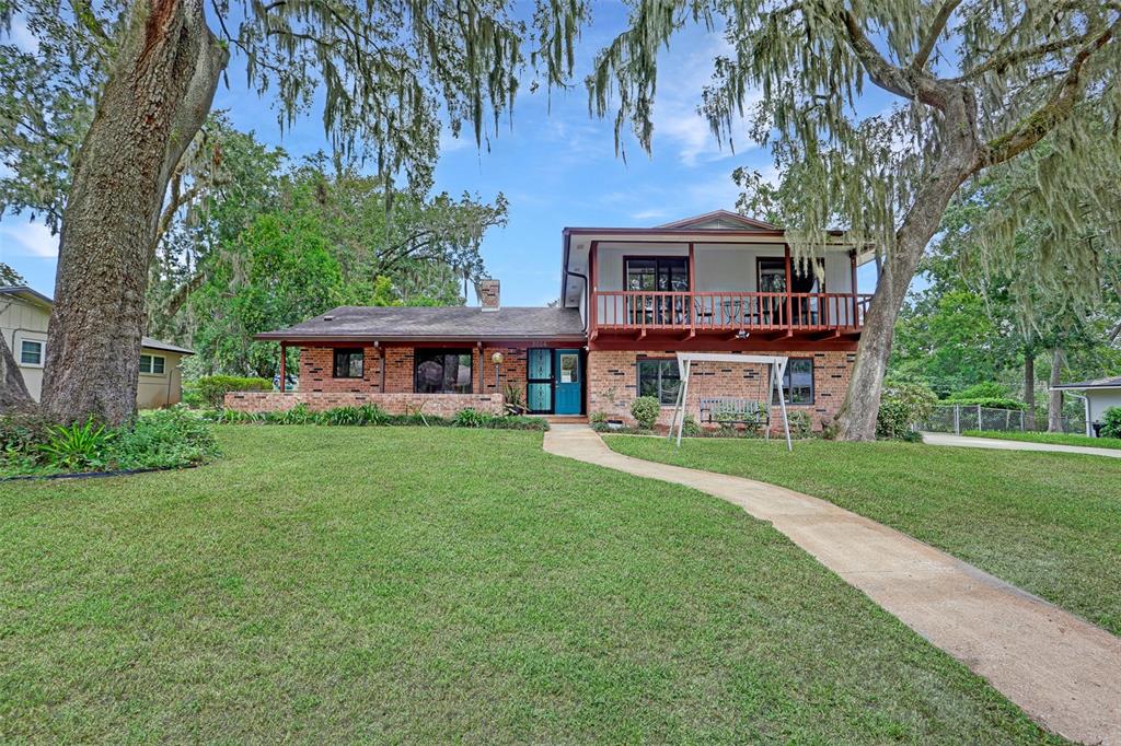 front view of a house with a yard