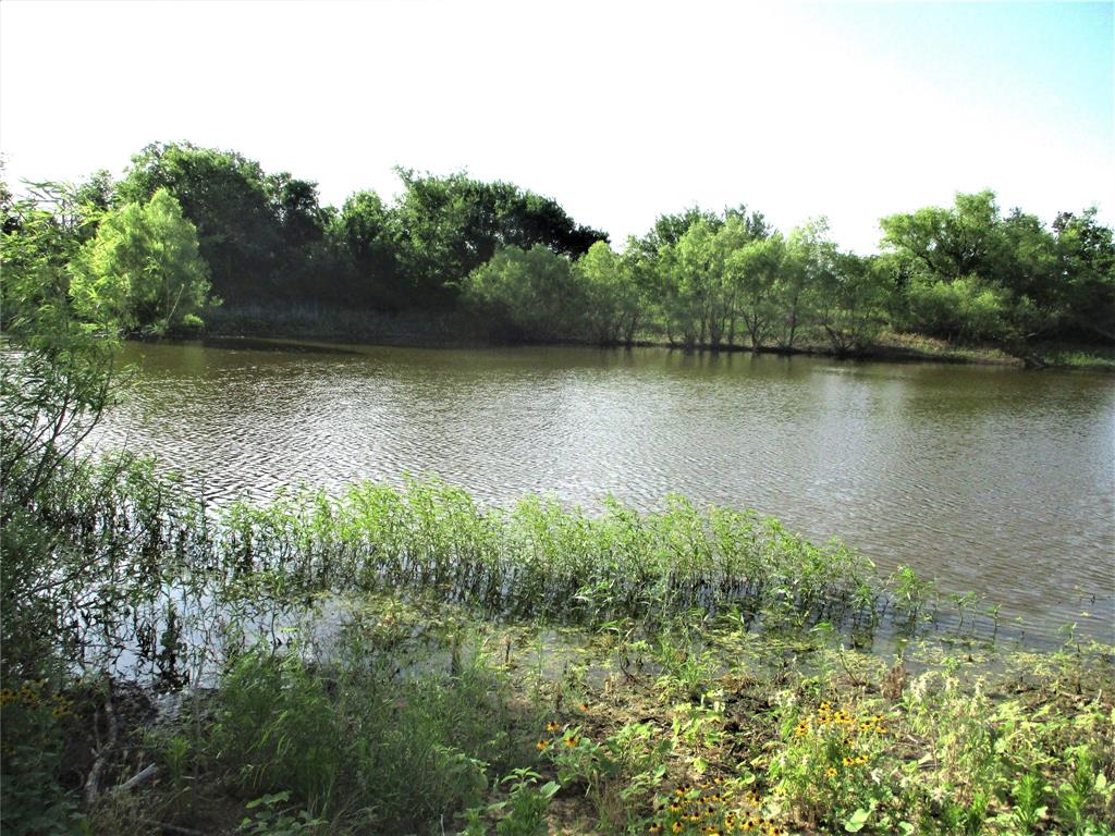 a view of a lake with a outdoor space