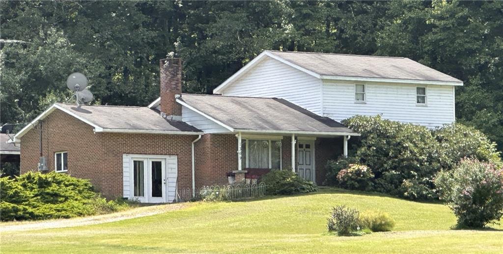 a view of a house with a swimming pool