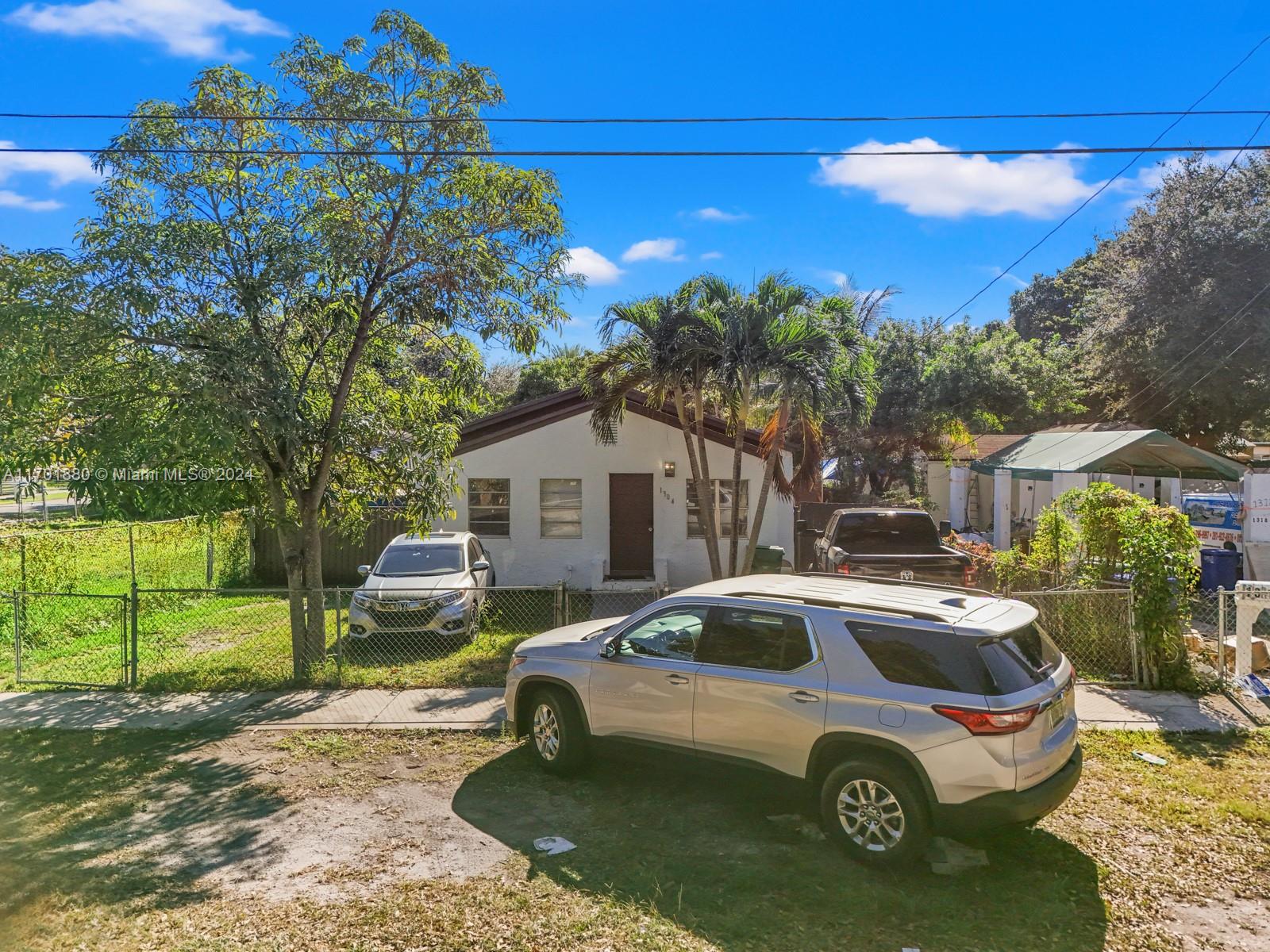 a car parked in front of a house