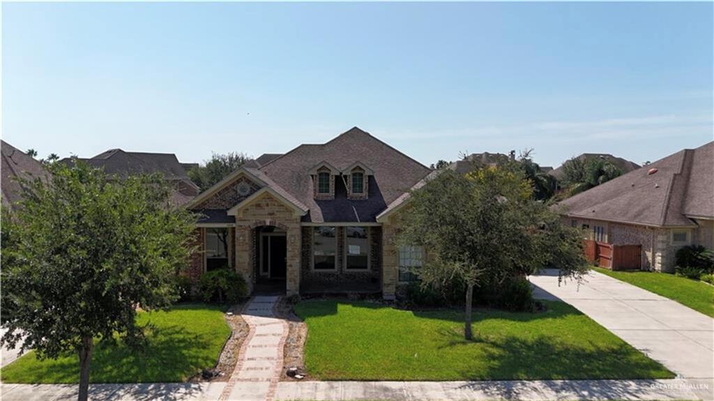 View of front of home featuring a front lawn