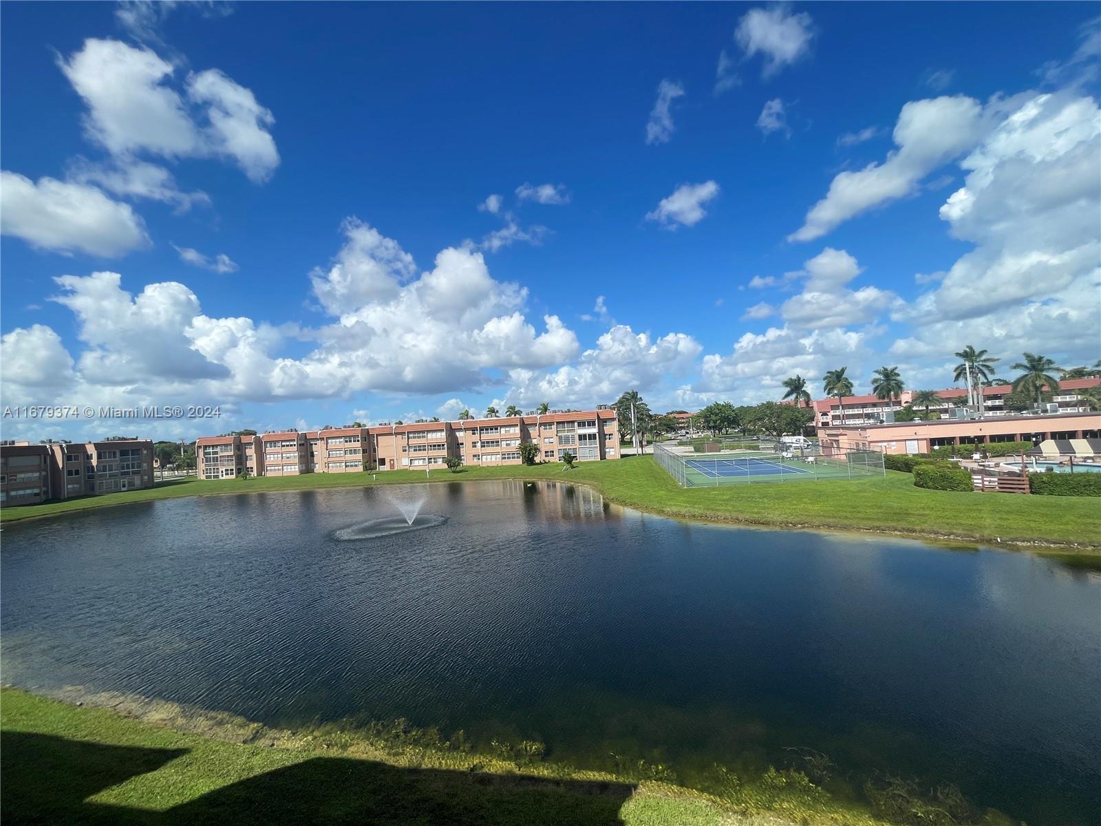 a view of swimming pool and lake