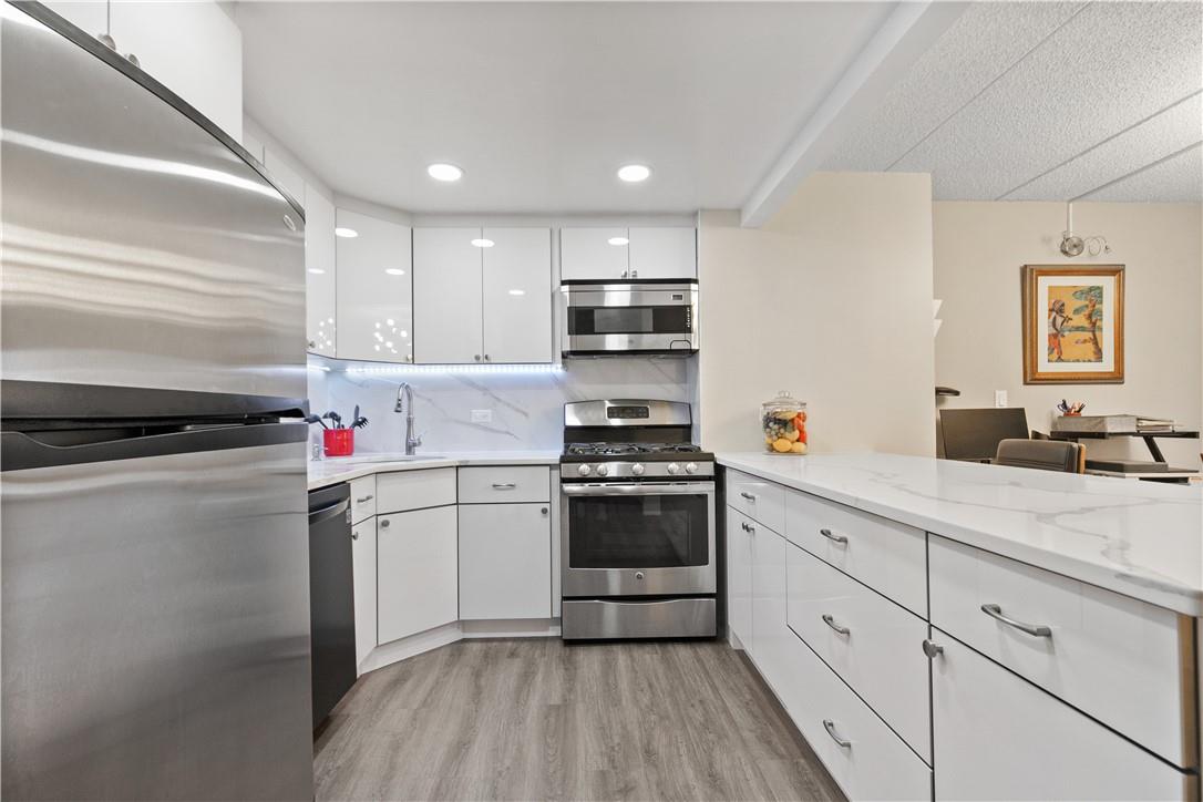 Renovated kitchen with stainless steel appliances