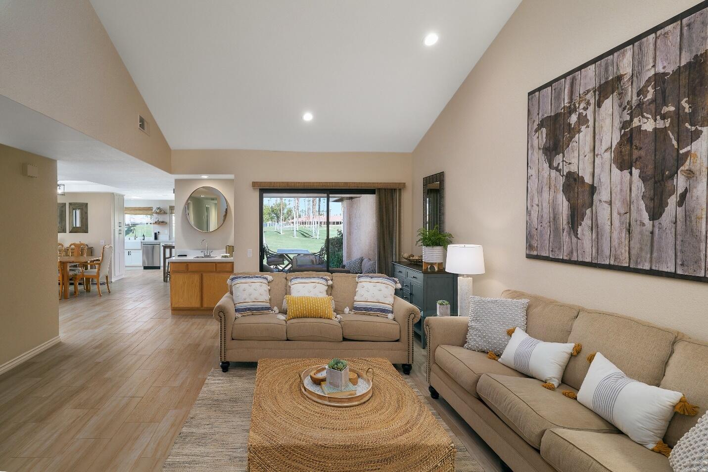 a living room with furniture or couch and a painting on the wall