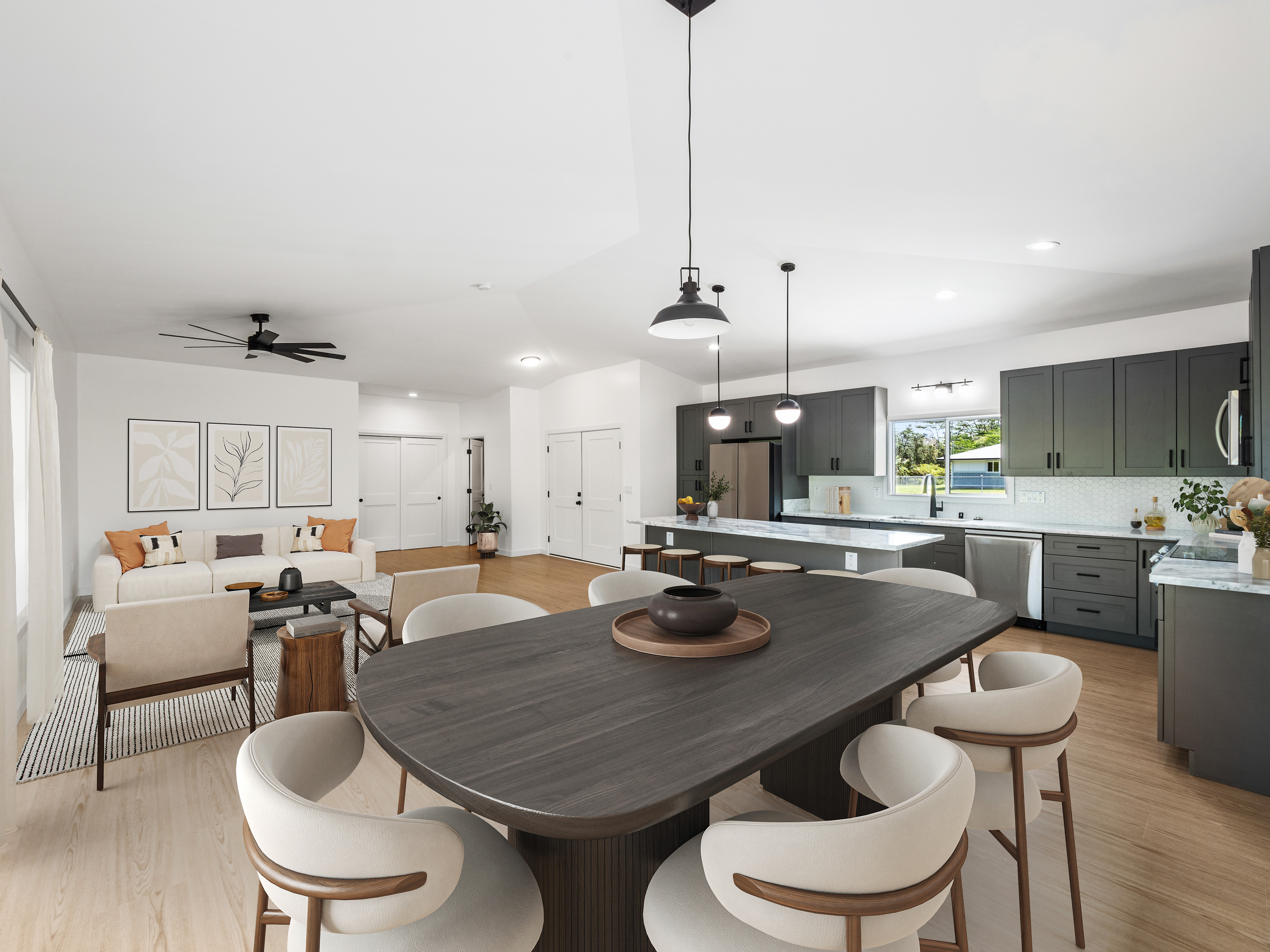 a kitchen with a table and chairs