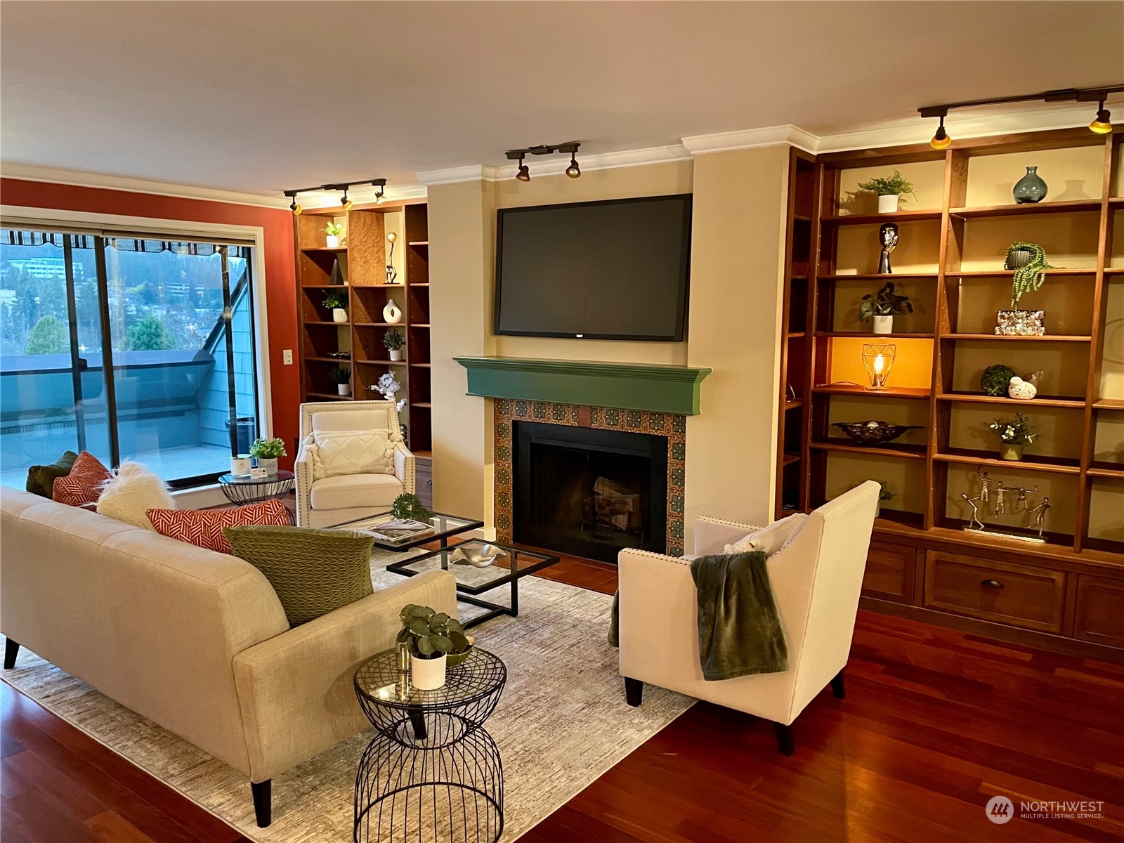 a living room with furniture fireplace and a flat screen tv