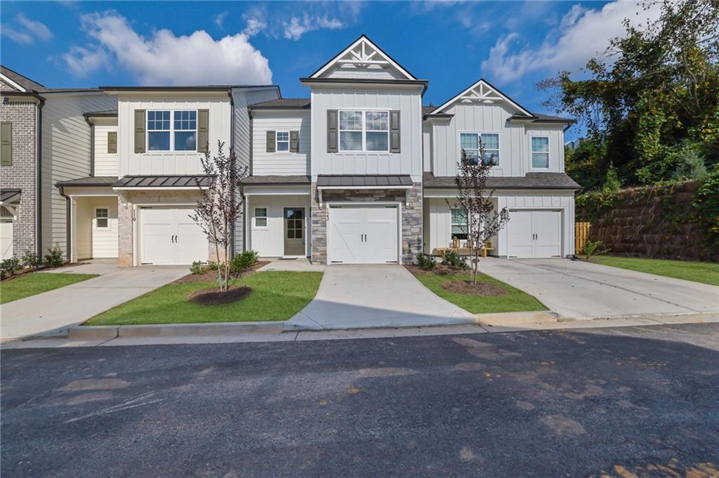 a view of house with yard and entertaining space