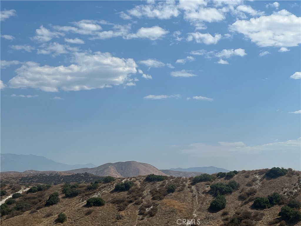 a view of mountain and mountain in the background