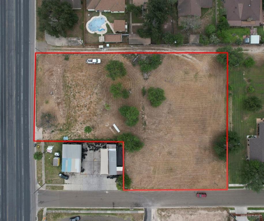 an aerial view of a house with outdoor space