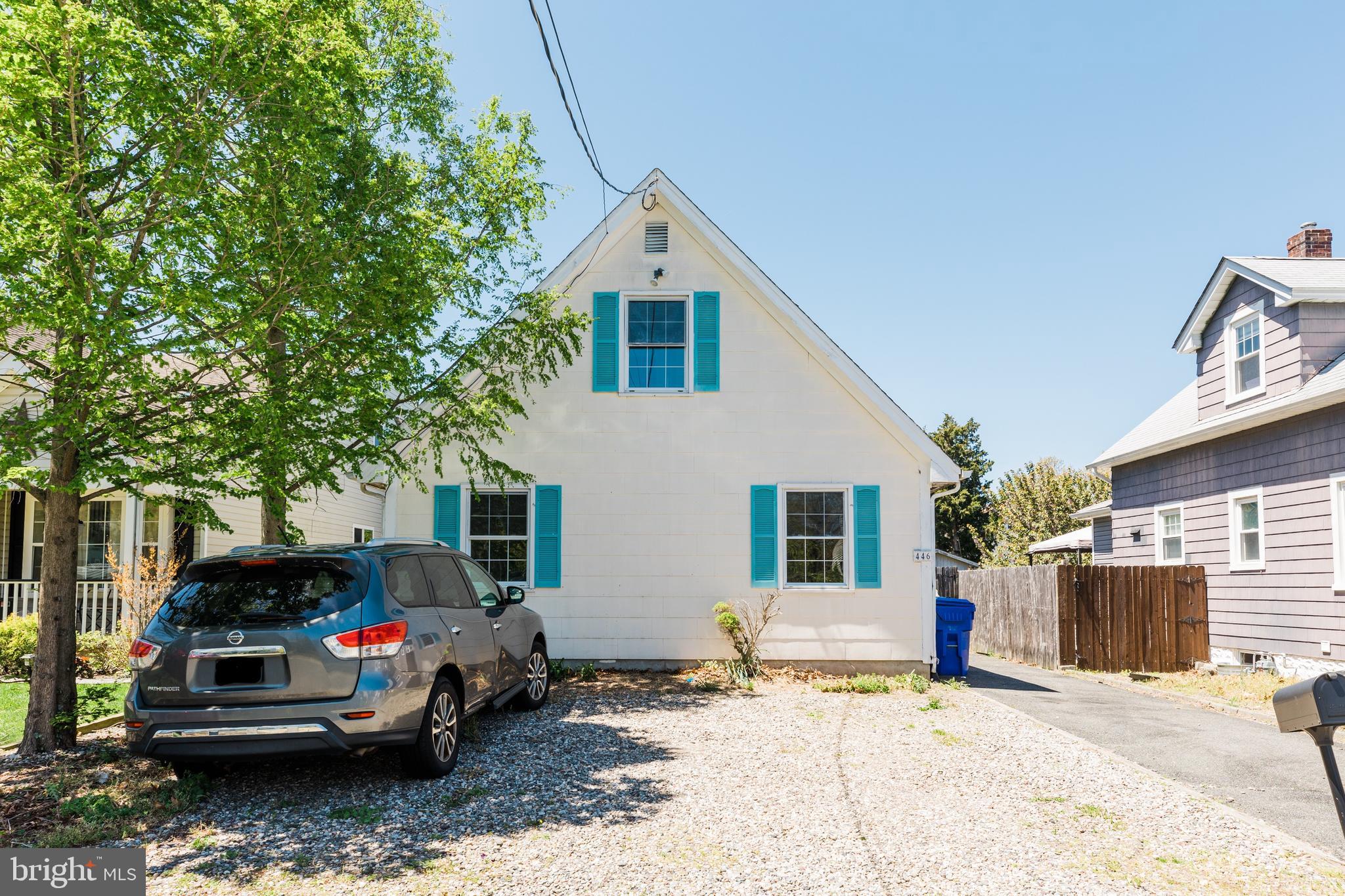 a car parked in front of a house