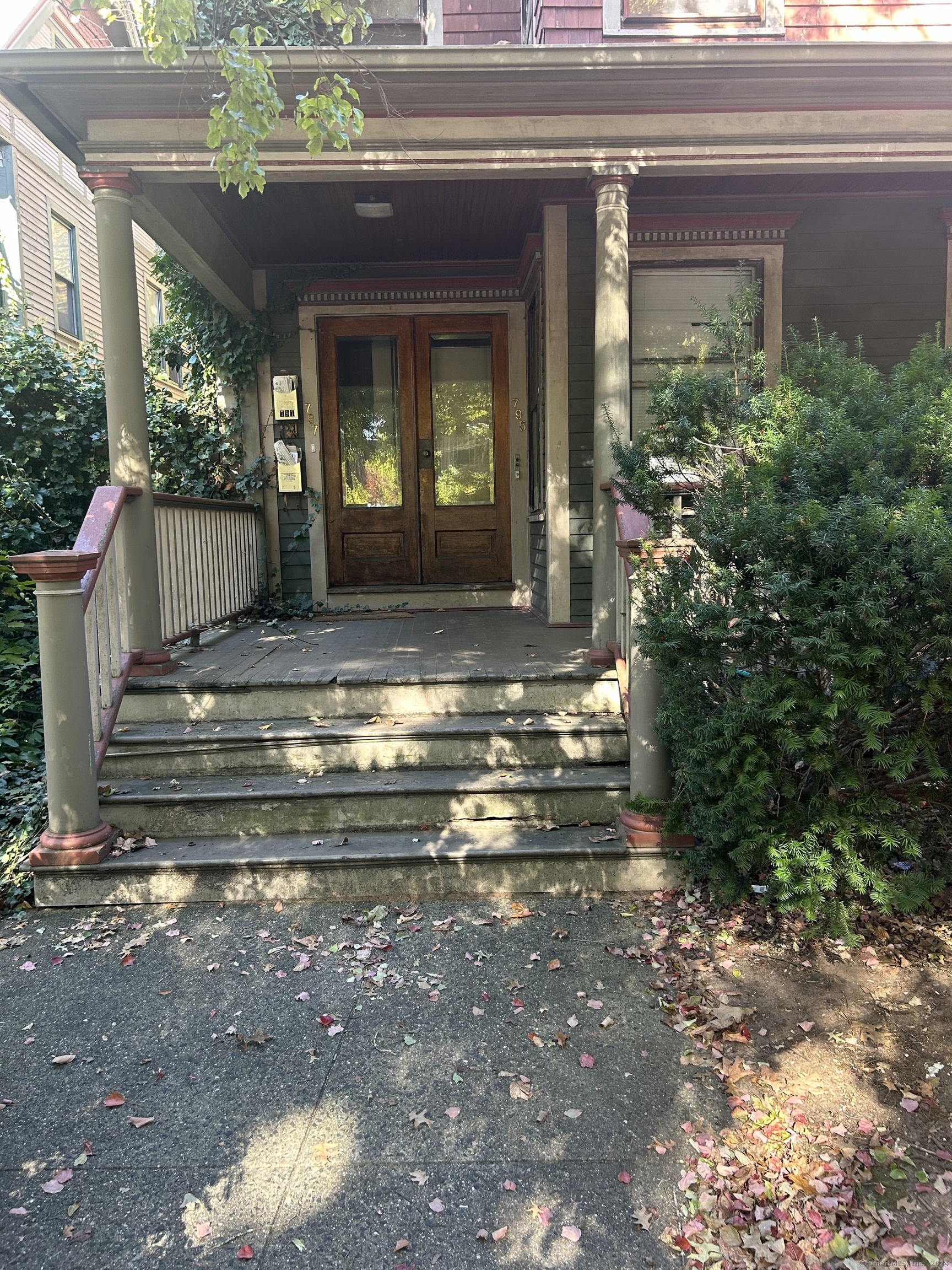 a view of a house with a porch