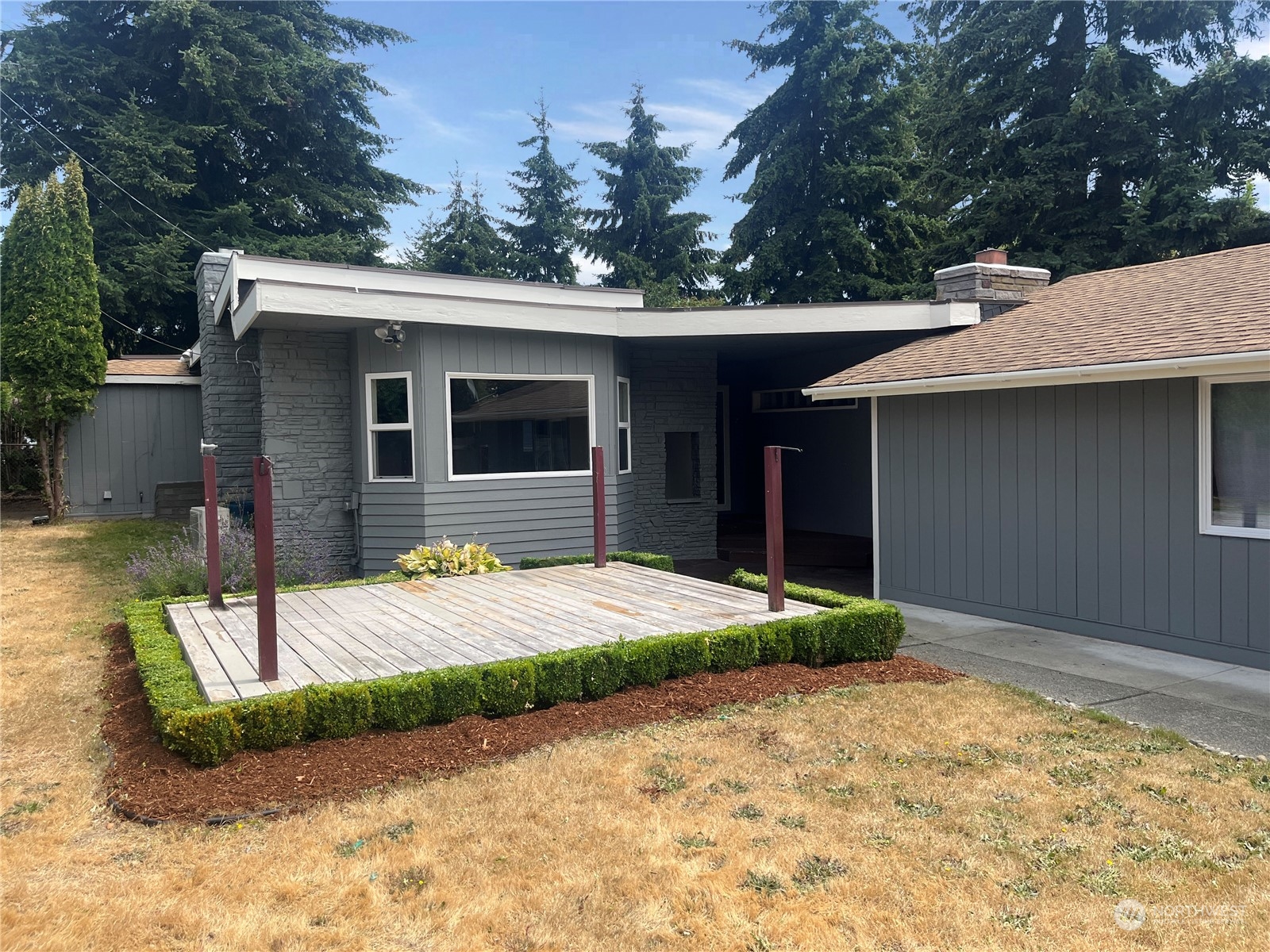 a house with yard in front of it