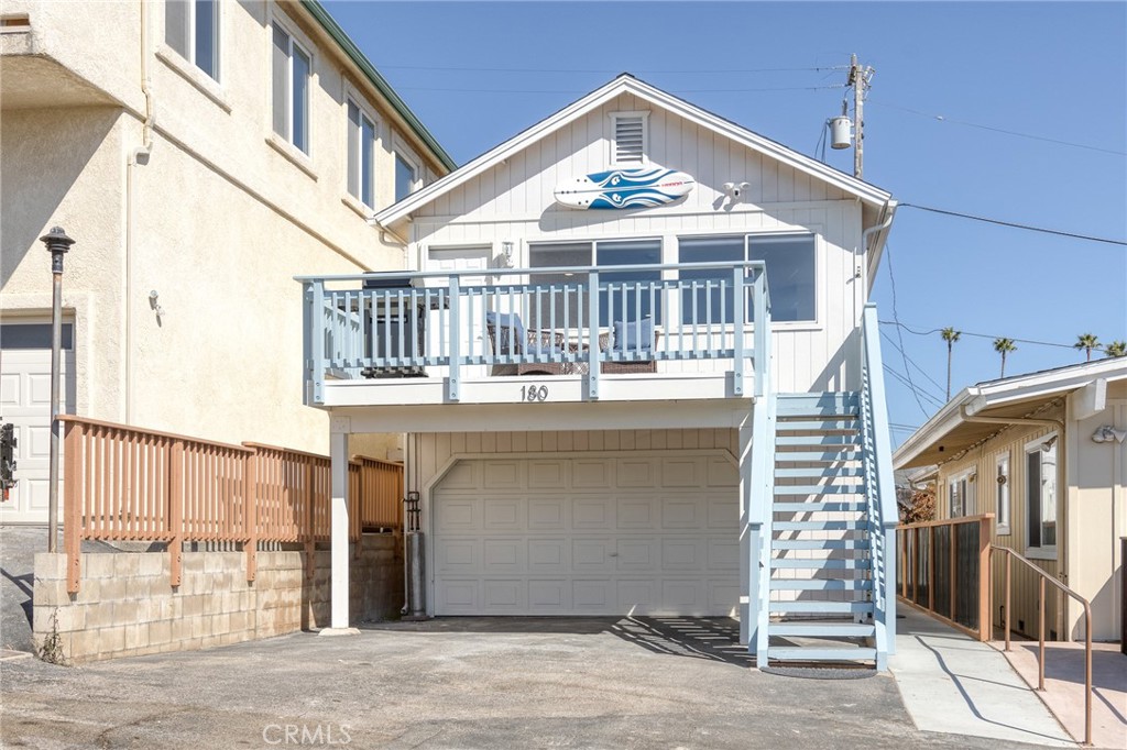 a front view of a house with a garage