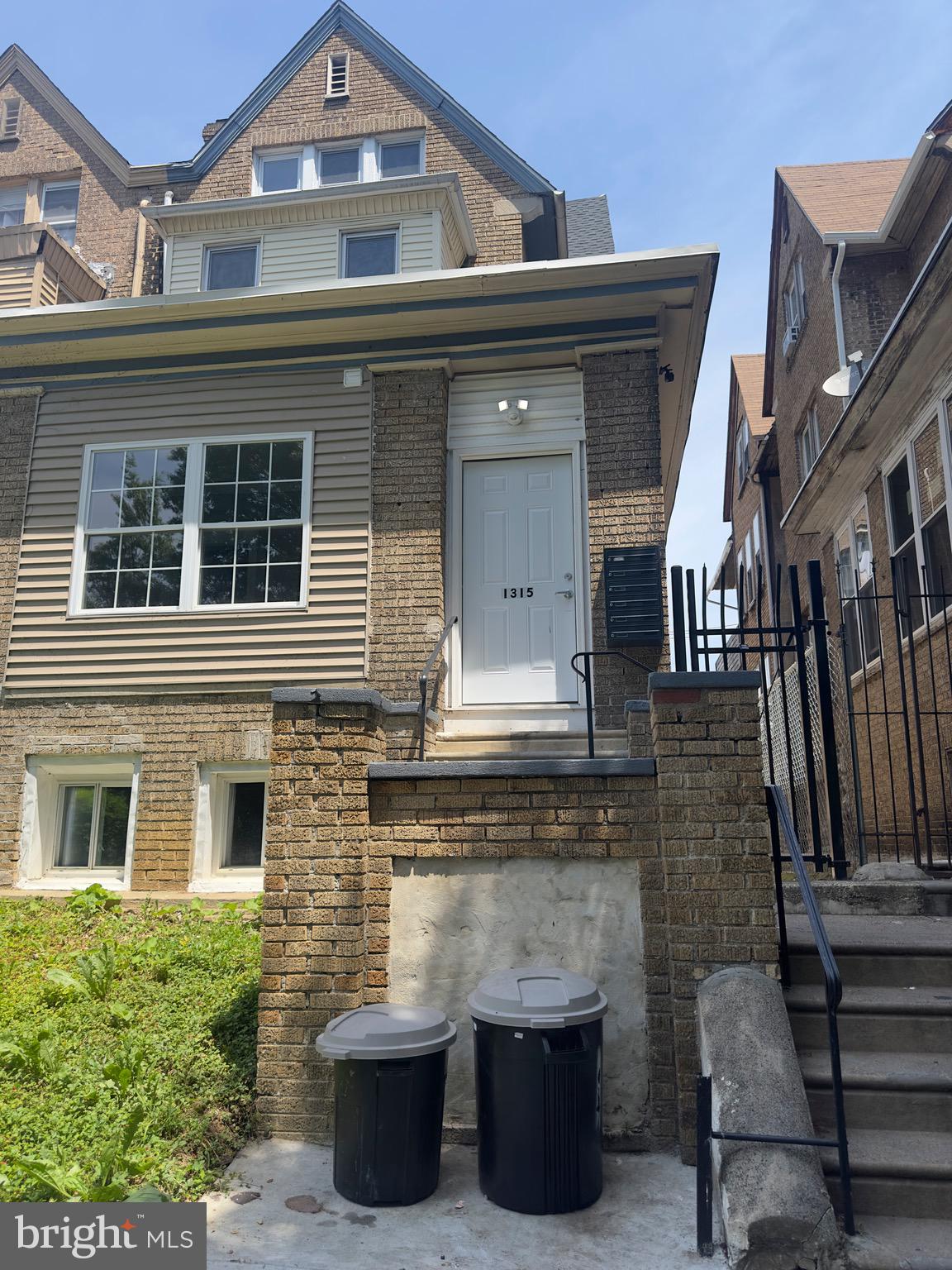 a front view of a house with a balcony