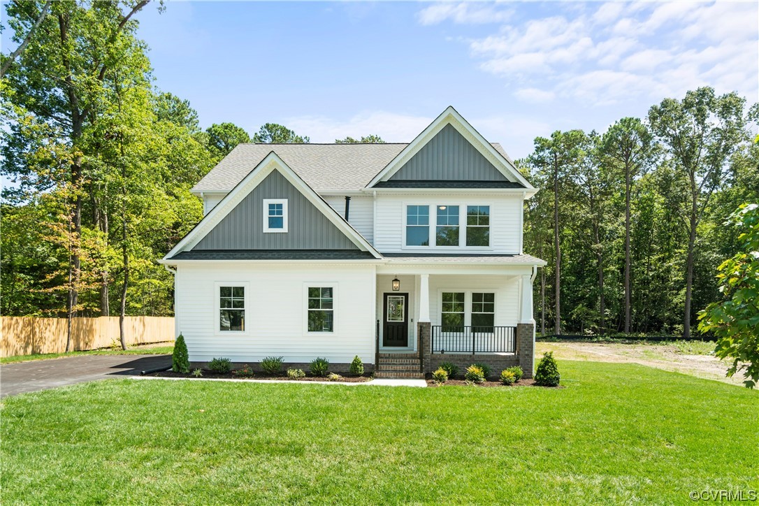 front view of a house with a yard