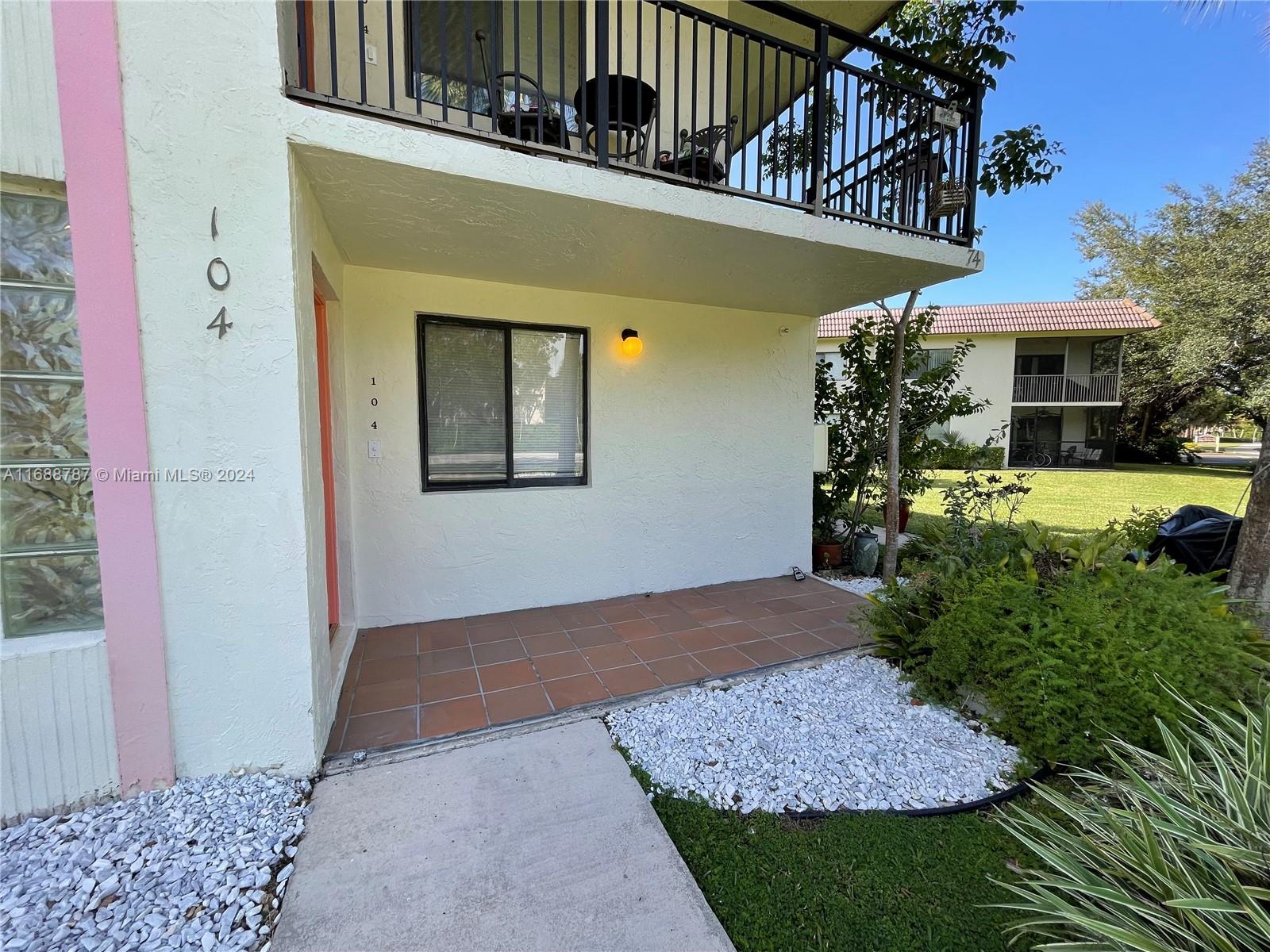 a view of a entryway door front of house