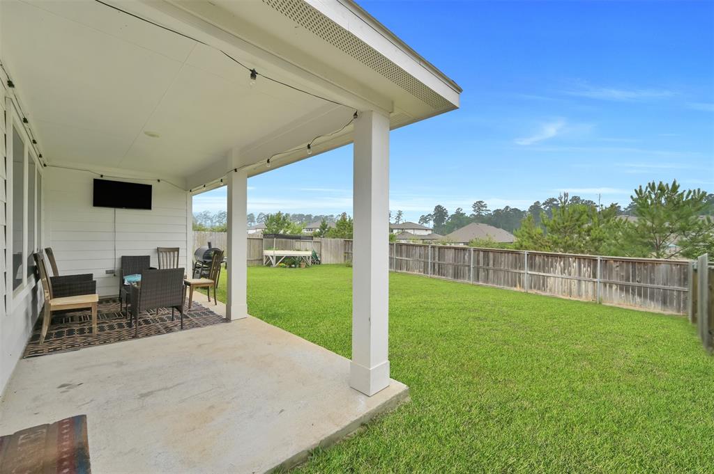 Backyard with no rear neighbors in this Foster's Ridge gem!