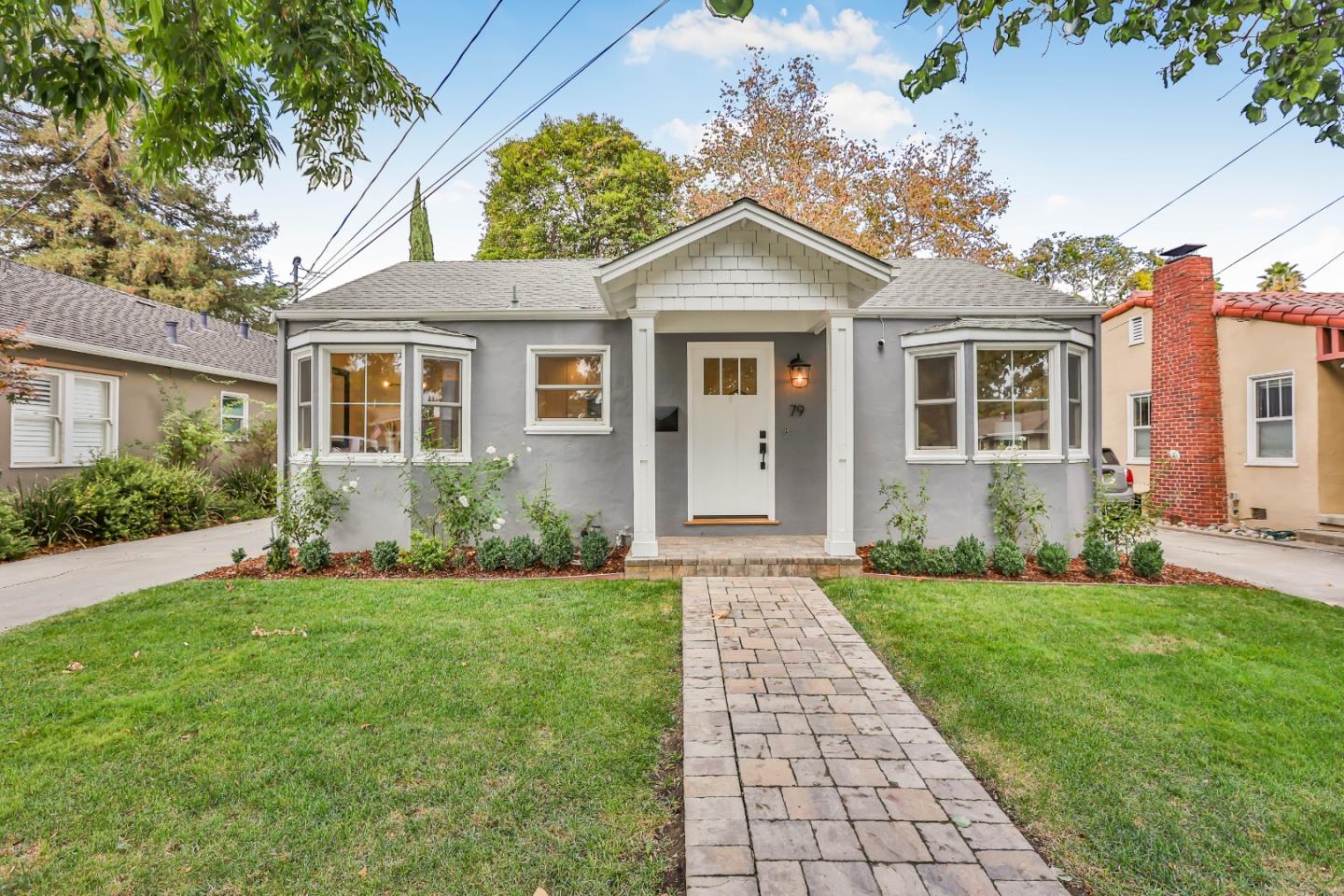 front view of a house with a yard