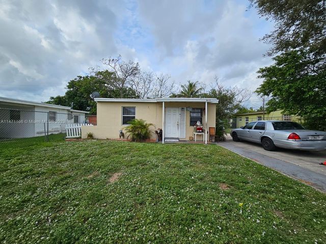 $449,999 | 1817 Northwest 25th Avenue | Lake Aire Palm View