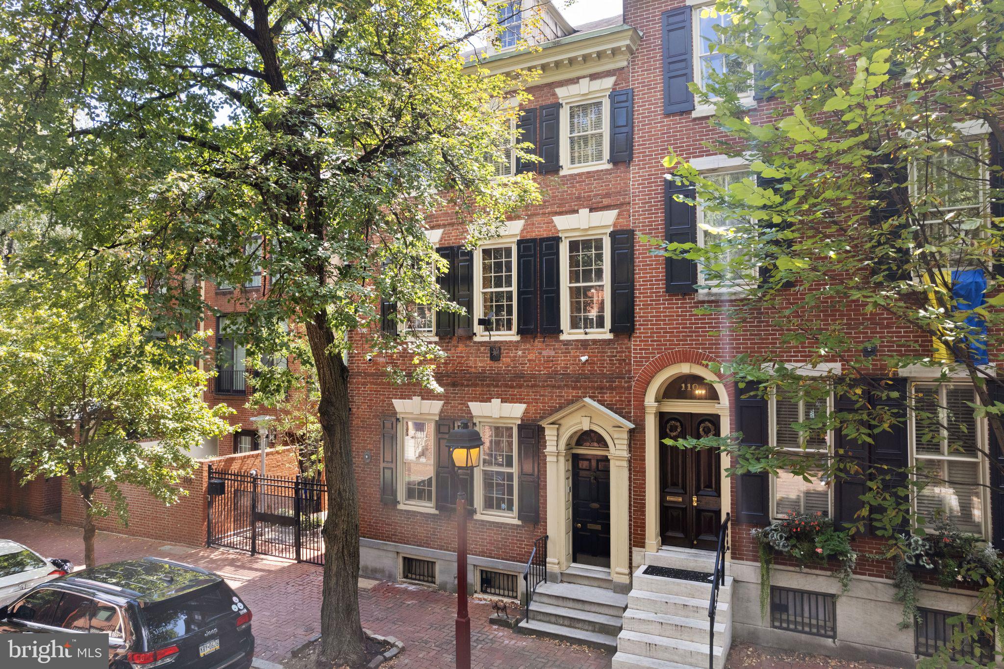 a front view of a building with street view