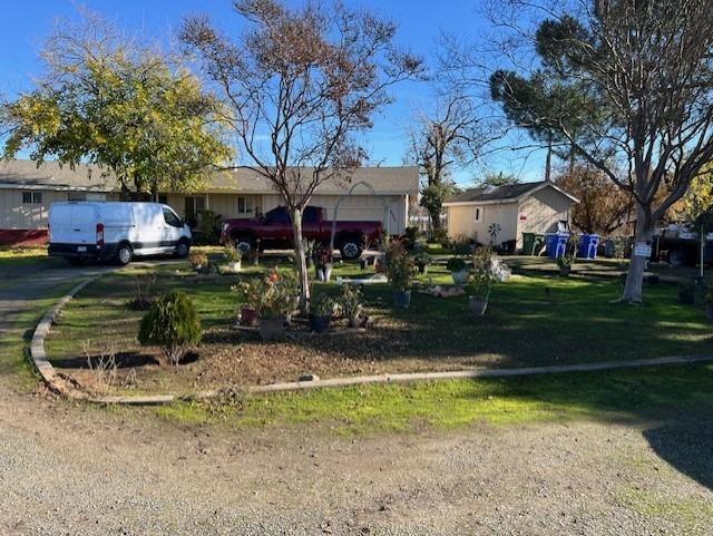 a view of a house with backyard porch and sitting area