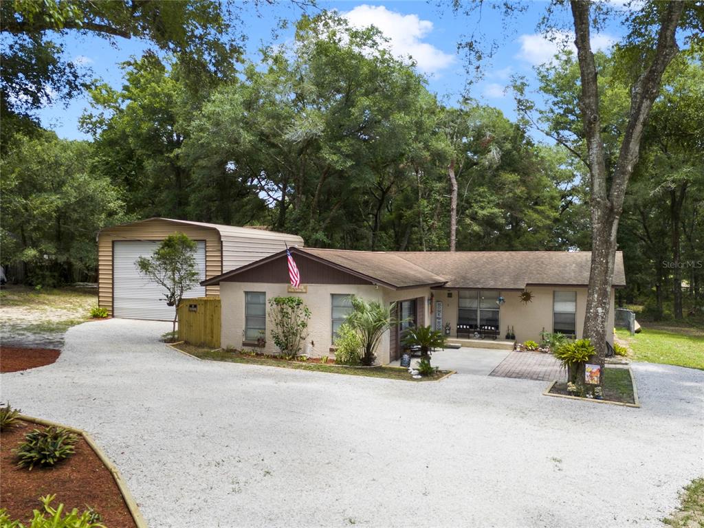 a view of a house with a patio