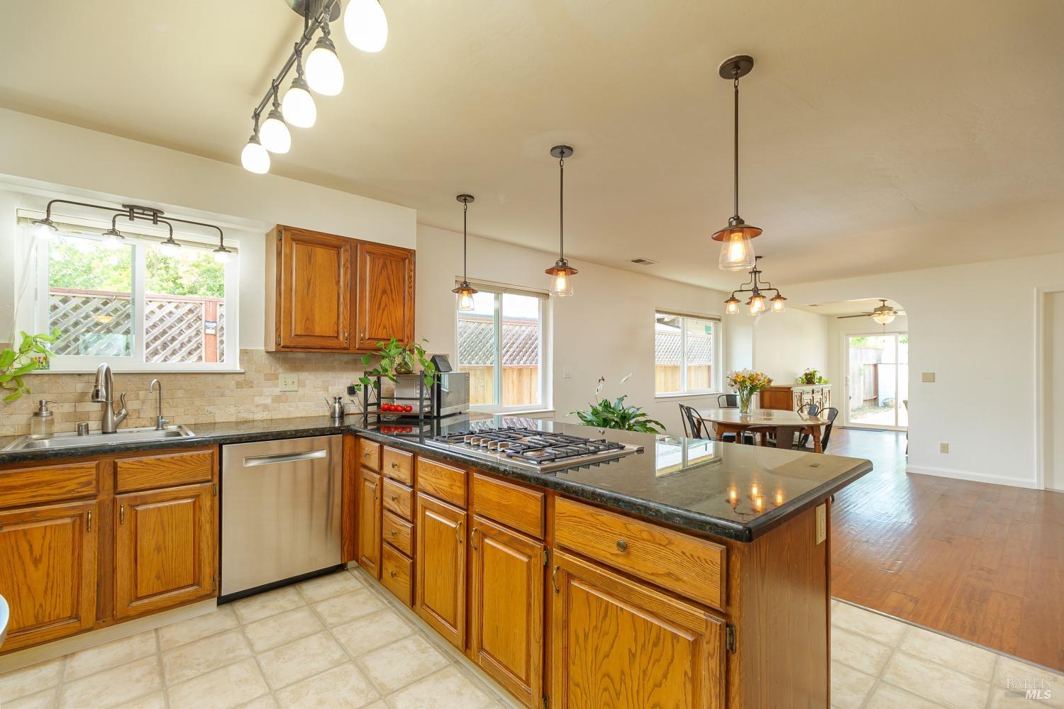 Fabulous kitchen with granite countertops, abundant storage and natural light