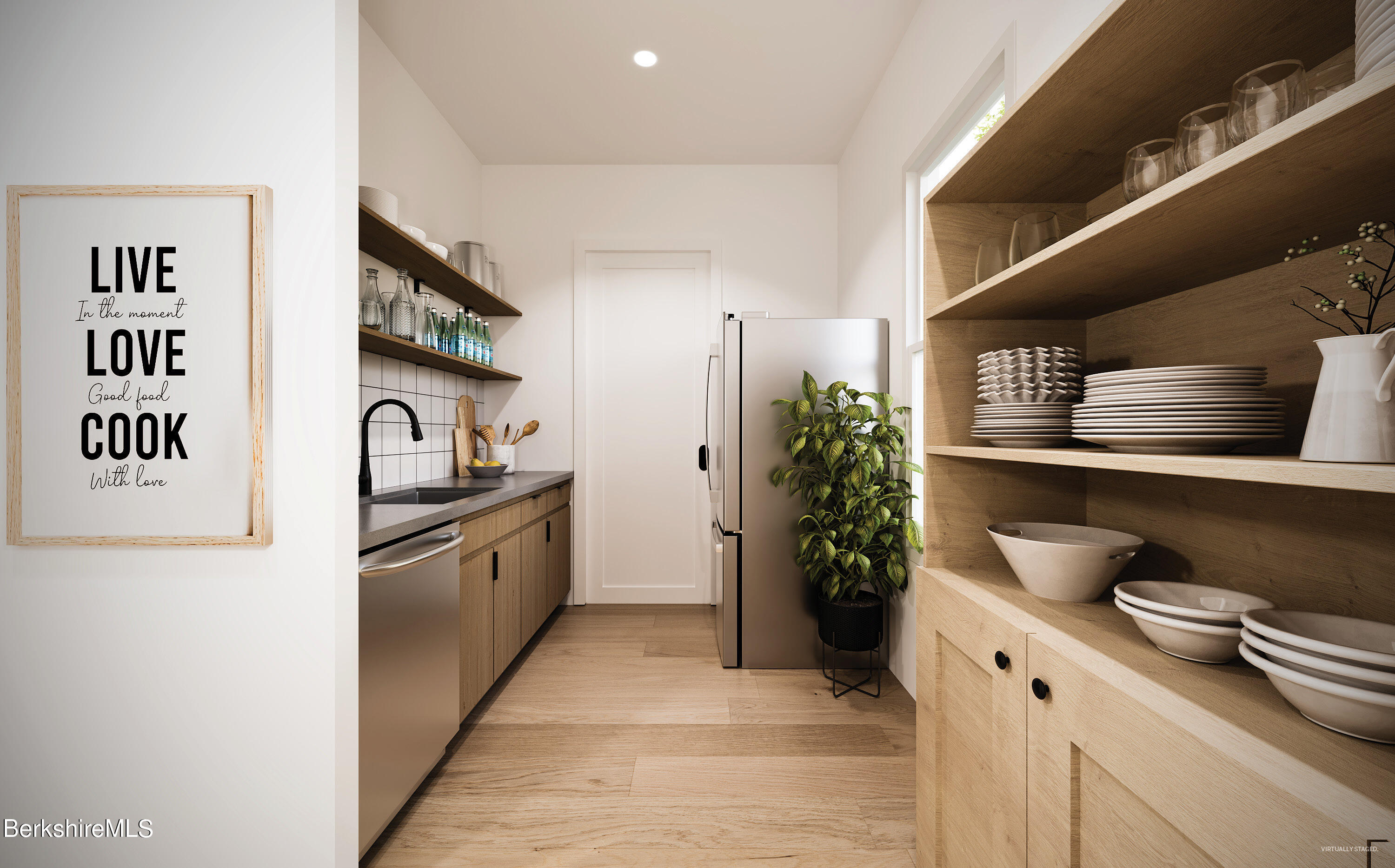 a kitchen with stainless steel appliances granite countertop a refrigerator and a stove