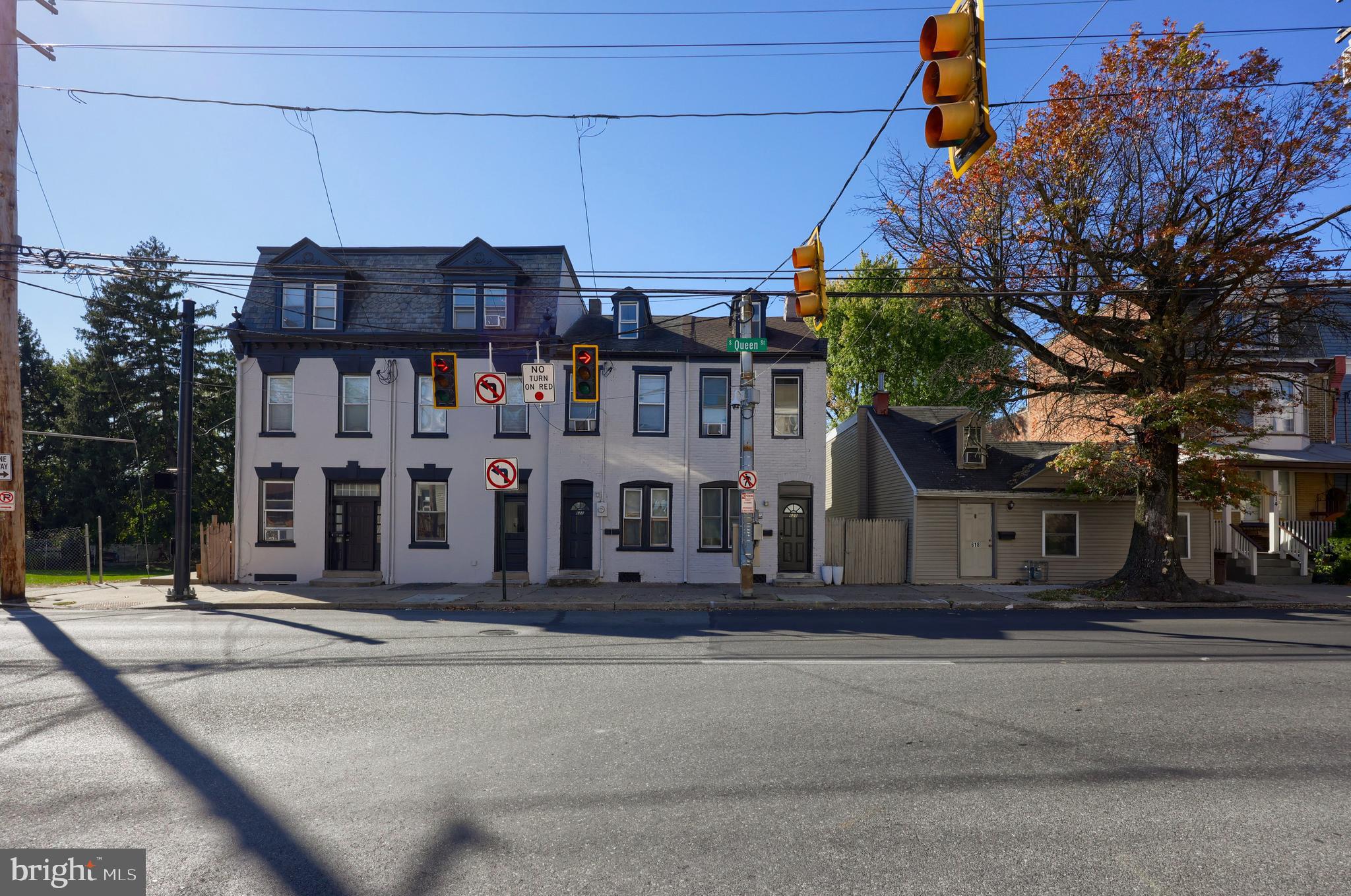 a front view of a building with street