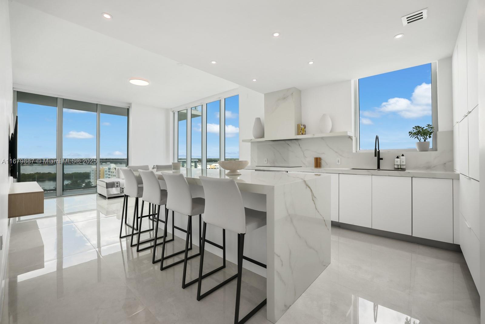 a kitchen with counter top space and appliances