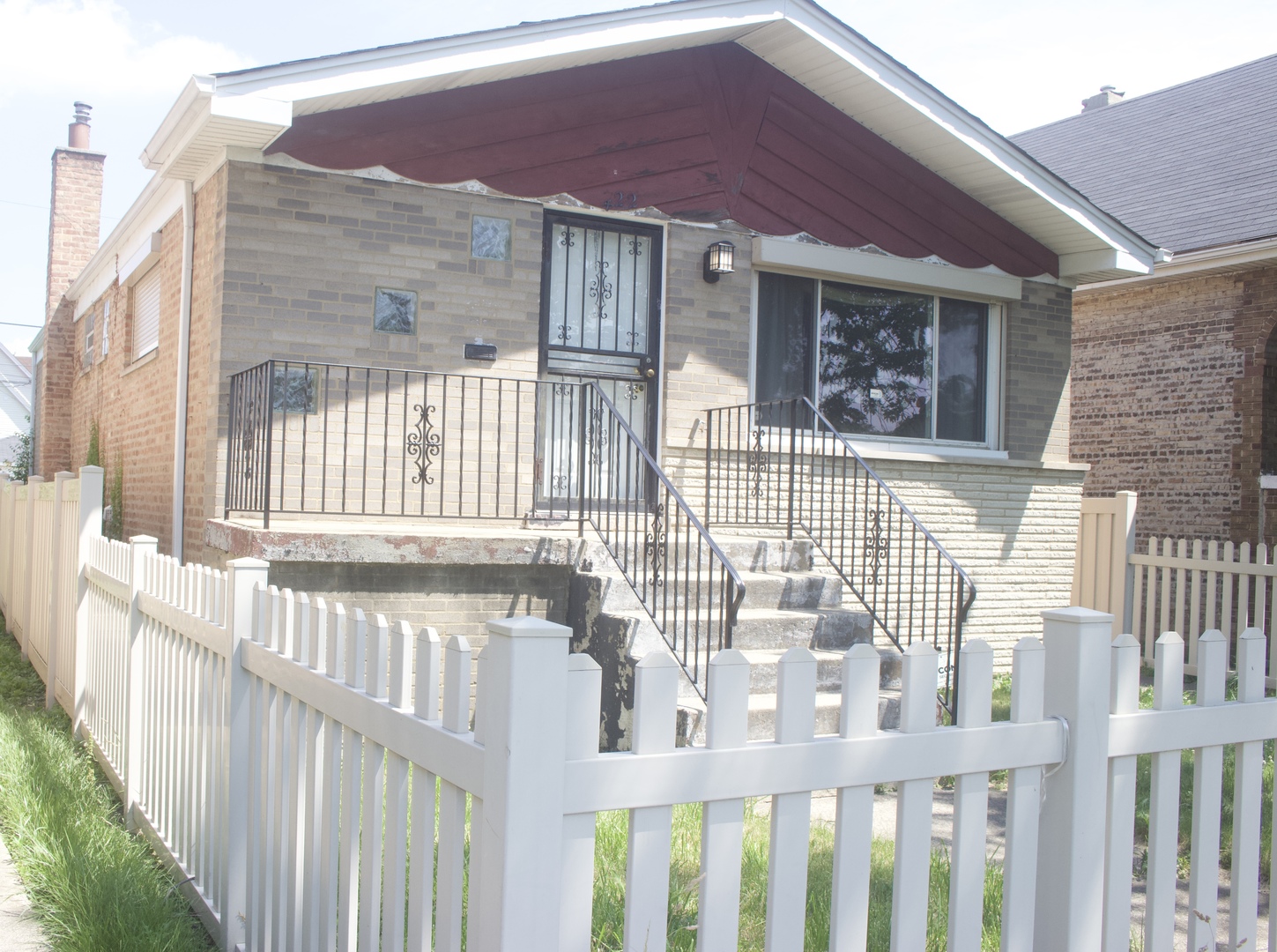 a front view of a house with a porch