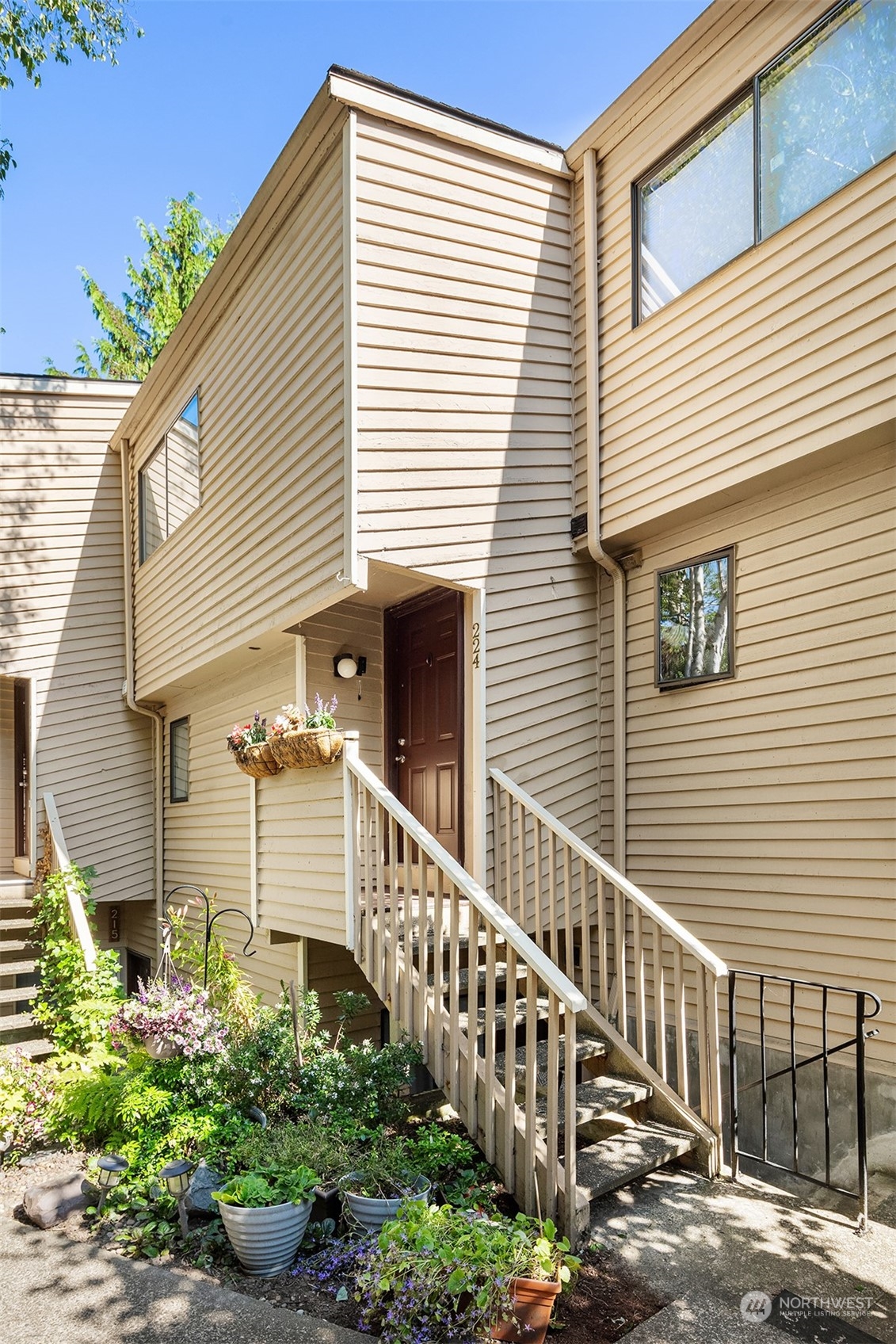 a view of a house with wooden stairs