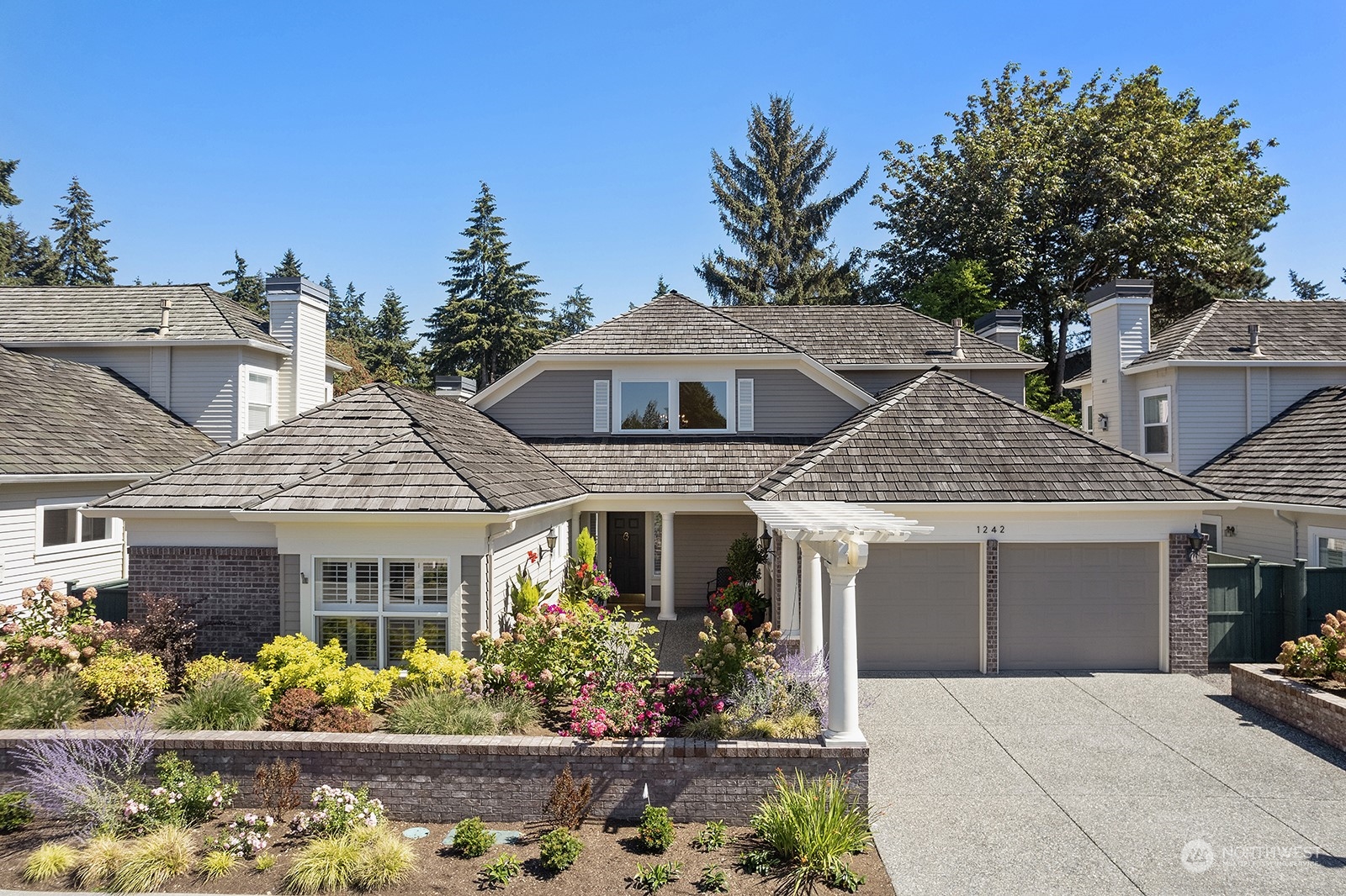 front view of a house with a yard